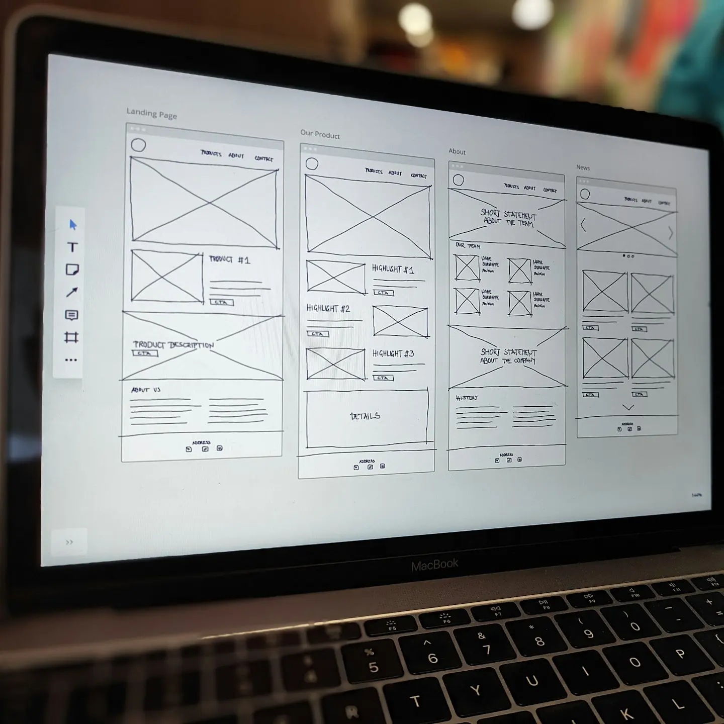 a laptop computer sitting on top of a table